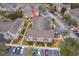 Aerial view showing a townhouse building's location and parking at 9141 Lee Vista Blvd # 305, Orlando, FL 32829