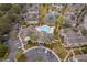 Aerial view showing community pool, clubhouse, and surrounding buildings at 9141 Lee Vista Blvd # 305, Orlando, FL 32829