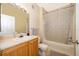 Clean bathroom with tub shower, vanity, and updated fixtures at 9141 Lee Vista Blvd # 305, Orlando, FL 32829