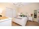 Bright bedroom with a comfortable bed and plenty of closet space at 9141 Lee Vista Blvd # 305, Orlando, FL 32829