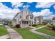 Two-story townhome with front porch and manicured landscaping at 9141 Lee Vista Blvd # 305, Orlando, FL 32829
