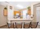 Kitchen with breakfast bar and plenty of cabinet storage at 9141 Lee Vista Blvd # 305, Orlando, FL 32829