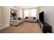 Spacious living room featuring two sofas at 9141 Lee Vista Blvd # 305, Orlando, FL 32829