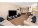 Comfortable living room with neutral colors and ample seating at 9141 Lee Vista Blvd # 305, Orlando, FL 32829