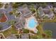 Community pool and spa with surrounding landscaping at 9141 Lee Vista Blvd # 305, Orlando, FL 32829