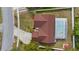 Aerial view of a home showcasing a screened in pool and spacious backyard at 9664 Lake Douglas Pl, Orlando, FL 32817
