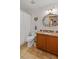 Traditional bathroom with a shower and a decorative ornate mirror at 9664 Lake Douglas Pl, Orlando, FL 32817