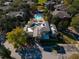 Aerial view of the community featuring a large clubhouse and a sparkling blue pool at 1341 Arbor Vista Loop # 321, Lake Mary, FL 32746