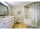 Bright bathroom with a white vanity, framed mirror, and shower-tub combination at 1341 Arbor Vista Loop # 321, Lake Mary, FL 32746