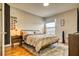 Cozy bedroom with hardwood floors, natural light, and neutral decor at 1341 Arbor Vista Loop # 321, Lake Mary, FL 32746