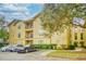 Inviting condo with a stucco exterior, well-kept landscaping, and ample parking at 1341 Arbor Vista Loop # 321, Lake Mary, FL 32746