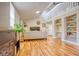 Open concept living area featuring hardwood floors and staircase to the second floor at 1341 Arbor Vista Loop # 321, Lake Mary, FL 32746