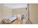 Cozy bedroom with hardwood floors and playful decor, perfect for a space at 13829 Ingelnook Dr, Windermere, FL 34786