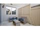 Comfortable patio area with wicker chairs, a table, and privacy fencing, creating a cozy outdoor space at 13829 Ingelnook Dr, Windermere, FL 34786