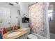 Cozy bathroom with a shower-tub combo, granite countertops, and neutral paint for a clean aesthetic at 14607 Traders Path, Orlando, FL 32837
