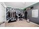 Eclectic bedroom featuring unique wall decor, carpet flooring, and a closet for ample storage space at 14607 Traders Path, Orlando, FL 32837