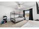 Bedroom showcasing a bunk bed, carpet flooring, and a ceiling fan for comfort and relaxation at 14607 Traders Path, Orlando, FL 32837