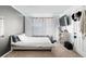 Comfortable bedroom with carpet flooring, a window, a ceiling fan, and neutral walls for a cozy feel at 14607 Traders Path, Orlando, FL 32837