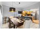 Cozy dining area open to a well-equipped kitchen with modern appliances and ample counter space at 14607 Traders Path, Orlando, FL 32837