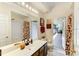 Bathroom with shower/tub combo and access to a screened porch at 14872 Faversham Cir, Orlando, FL 32826