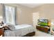 Guest bedroom with double bed and flat screen TV at 14872 Faversham Cir, Orlando, FL 32826