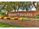 Brick entrance sign to University Estates community at 14872 Faversham Cir, Orlando, FL 32826