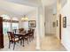 Formal dining room with wooden table and chairs at 14872 Faversham Cir, Orlando, FL 32826
