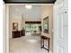 Bright and spacious entryway with tile floors and views to living room at 14872 Faversham Cir, Orlando, FL 32826