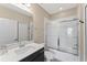 Updated bathroom with a tub, shower, and vanity at 153 Villa Domani Cir, Davenport, FL 33896