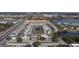 Aerial view of the community, highlighting its modern homes and serene waterfront setting at 153 Villa Domani Cir, Davenport, FL 33896