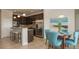 Kitchen with breakfast nook, granite countertops, and stainless steel appliances at 1575 Weaver Oak Way, Deland, FL 32720