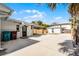 The backyard features a large driveway and a storage shed at 1911 Canton St, Orlando, FL 32803