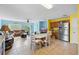 Expansive living area with seamless flow between the living room, dining area, and kitchen, offering flexible living at 2029 Knollcrest Dr, Clermont, FL 34711