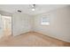 Spacious bedroom with carpeted floor and window at 2049 Jefferson Ave, Deltona, FL 32738