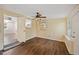 Bright bonus room with wood flooring and ceiling fan at 2049 Jefferson Ave, Deltona, FL 32738
