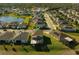 Aerial view of house and neighborhood, near lake at 2089 Camden Loop, Davenport, FL 33837