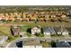 Aerial view of house and surrounding neighborhood at 2089 Camden Loop, Davenport, FL 33837