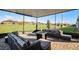 Relaxing backyard patio with sectional sofa and fire pit at 2089 Camden Loop, Davenport, FL 33837