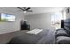 Spacious bedroom with a king-size bed and TV at 2089 Camden Loop, Davenport, FL 33837
