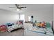 ' bedroom with two twin beds and toys at 2089 Camden Loop, Davenport, FL 33837