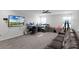 Multipurpose bonus room with TV and seating at 2089 Camden Loop, Davenport, FL 33837