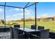 Outdoor patio with table and chairs, perfect for dining at 2089 Camden Loop, Davenport, FL 33837