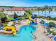 Relaxing pool area with water slide and ample lounge chairs at 2089 Camden Loop, Davenport, FL 33837