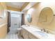 Bright bathroom with double sinks and a shower/tub combination at 2460 Worthington Rd, Maitland, FL 32751