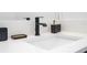 Modern bathroom featuring a sleek countertop and fixtures at 2595 Santorini Dr, Kissimmee, FL 34747