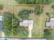 Property view showcasing house, large yard, and a shed at 2770 Windsong Ln, St Cloud, FL 34772
