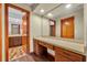 Bathroom with vanity, mirror and access to another bathroom at 2770 Windsong Ln, St Cloud, FL 34772