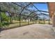 Spacious screened patio overlooks the backyard at 2770 Windsong Ln, St Cloud, FL 34772