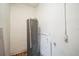 Utility room featuring a hot water tank at 3115 Avenue U Nw, Winter Haven, FL 33881