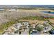 Aerial view showcasing home and community landscape at 3291 Pawleys N Loop, St Cloud, FL 34769